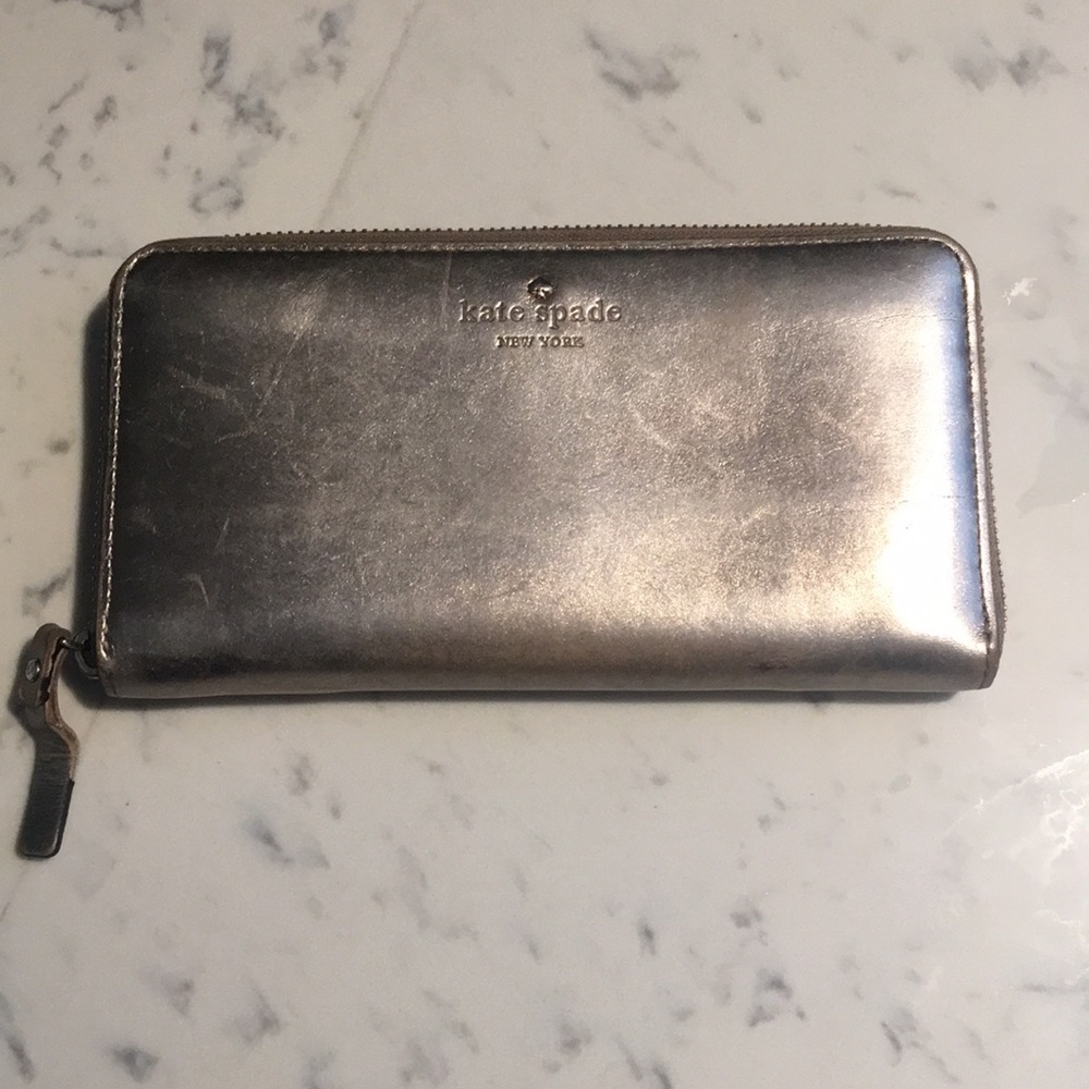 Used Kate Spade metallic silver/gold wallet